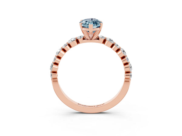 Rose gold Marquise Cut Aquamarine Prong Set Engagement Ring with Pavé Band