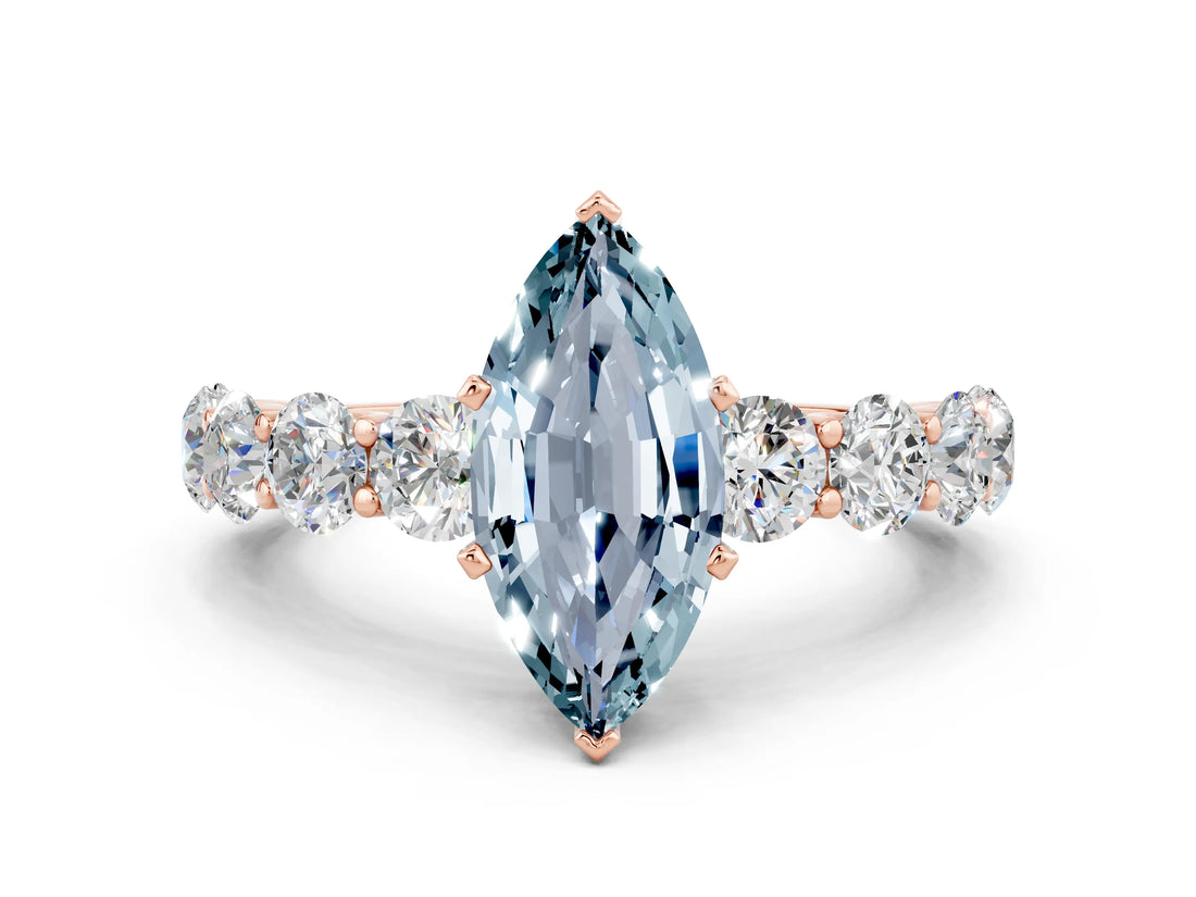 Rose gold Marquise Cut Aquamarine Prong Setting with Side Stones on a Pave Band