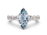 Rose gold Marquise Cut Aquamarine Prong Setting with Side Stones on a Pave Band