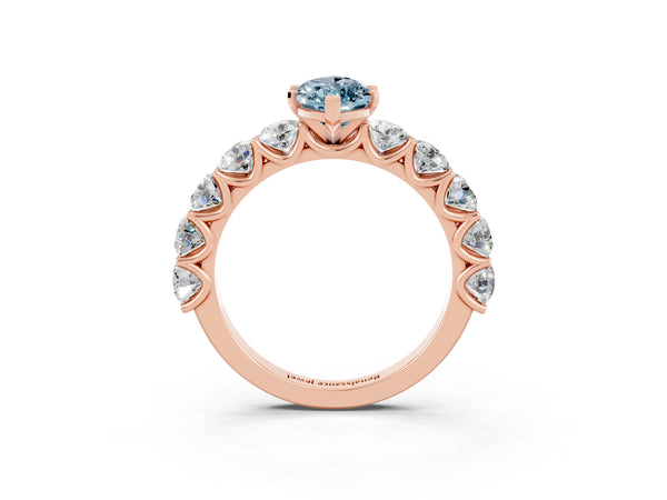 Rose gold Marquise Cut Aquamarine Prong Setting with Side Stones on a Pave Band