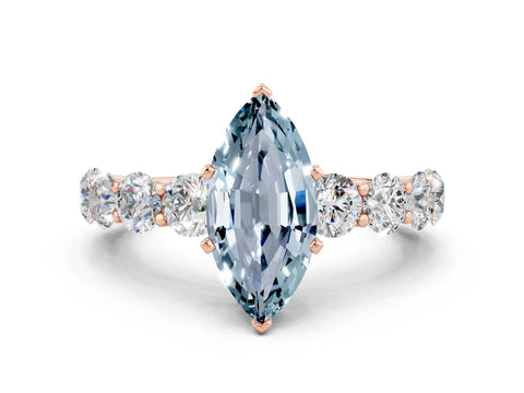 Rose gold Marquise Cut Aquamarine Prong Setting with Side Stones on a Pave Band
