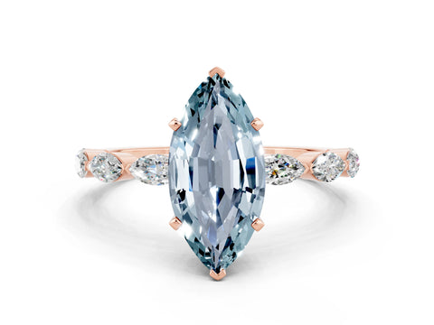 Rose gold Marquise Cut Aquamarine Ring with Marquise Side Stones and Prong Setting