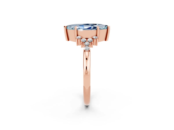 Rose gold Marquise Cut Aquamarine Ring with Side Stones and Four-Prong Setting