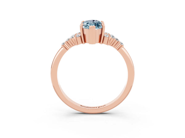 Rose gold Marquise Cut Aquamarine Ring with Side Stones and Four-Prong Setting
