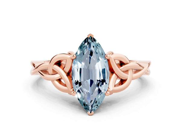 Rose gold Marquise Cut Aquamarine Solitaire Celtic Knot Ring with Four-Prong Setting