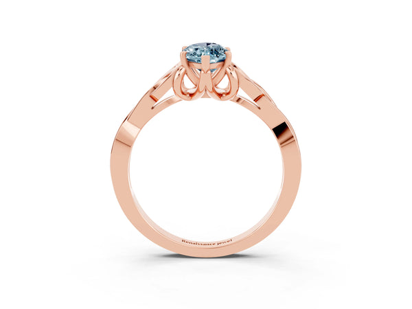 Rose gold Marquise Cut Aquamarine Solitaire Engagement Ring with Celtic Knot Band and Four-Prong Setting