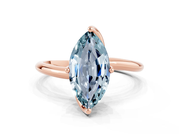 Rose gold Marquise Cut Aquamarine Solitaire Engagement Ring with Four-Prong Setting and Classic Band