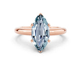 Rose gold Marquise Cut Aquamarine Solitaire Engagement Ring with Round Band and Four-Prong Setting