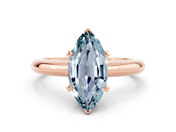 Rose gold Marquise Cut Aquamarine Solitaire Engagement Ring with Round Band and Four-Prong Setting