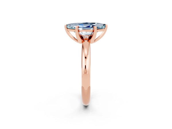 Rose gold Marquise Cut Aquamarine Solitaire Engagement Ring with Round Band and Four-Prong Setting