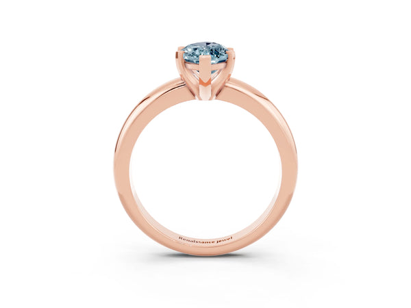 Rose gold Marquise Cut Aquamarine Solitaire Engagement Ring with Round Band and Four-Prong Setting