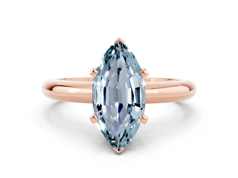 Rose gold Marquise Cut Aquamarine Solitaire Engagement Ring with Round Band and Four-Prong Setting