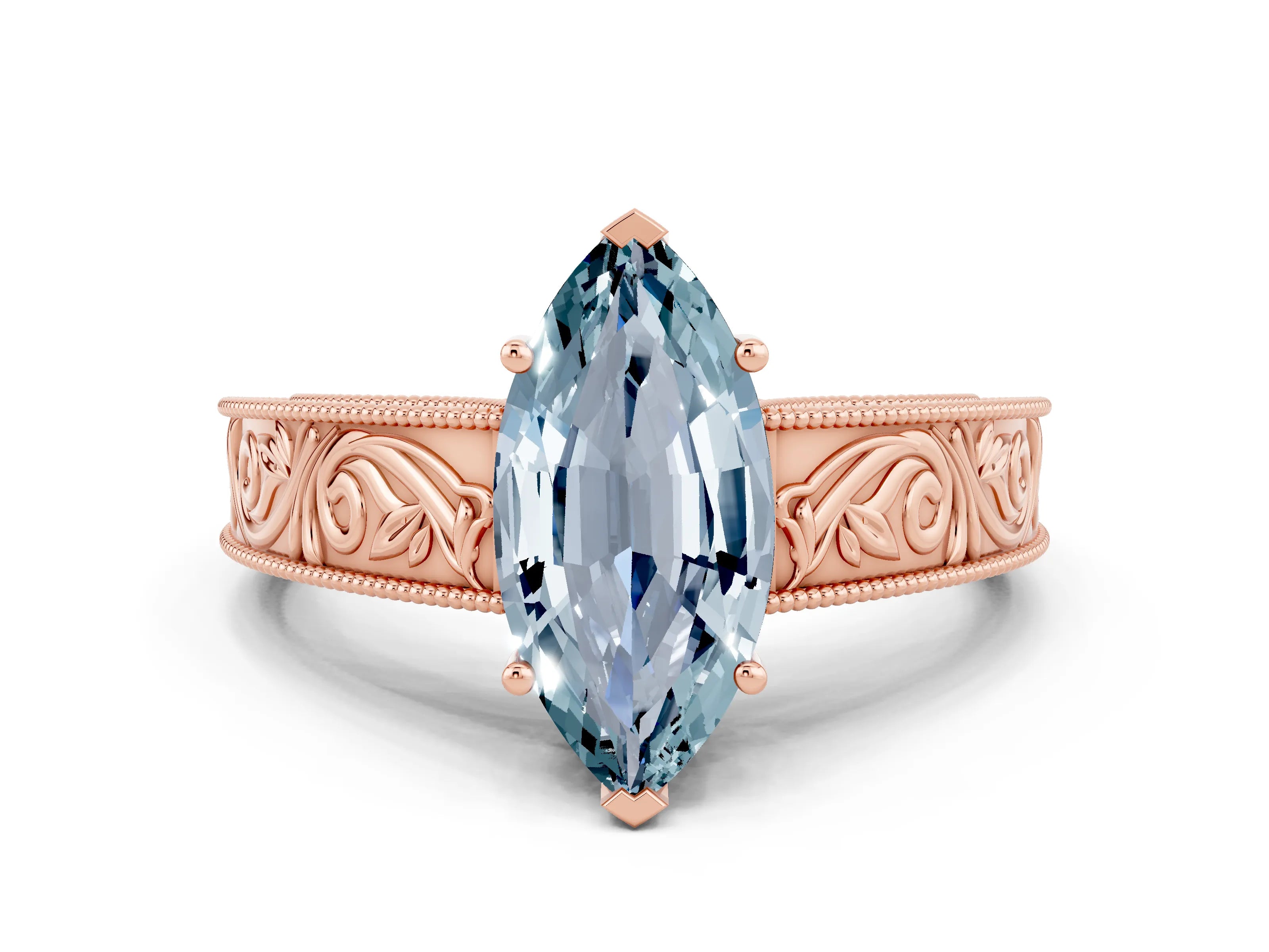 Rose gold Marquise Cut Aquamarine Solitaire Ring with Engraved Band and Four-Prong Setting