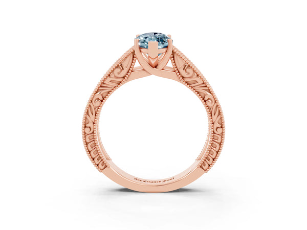 Rose gold Marquise Cut Aquamarine Solitaire Ring with Engraved Band and Four-Prong Setting