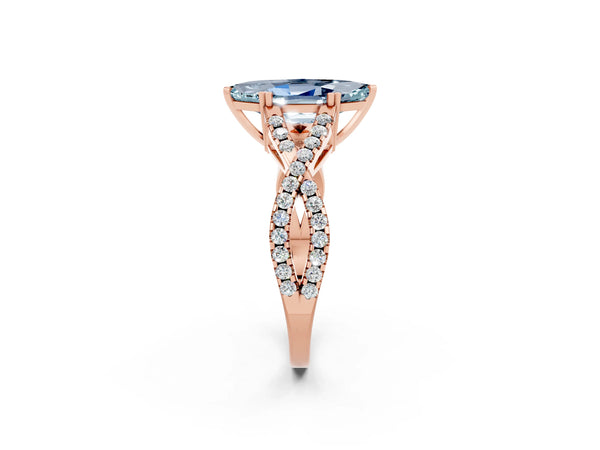 Rose gold Marquise Cut Aquamarine Solitaire Ring with Four-Prong Setting and Twisted Pavé Band