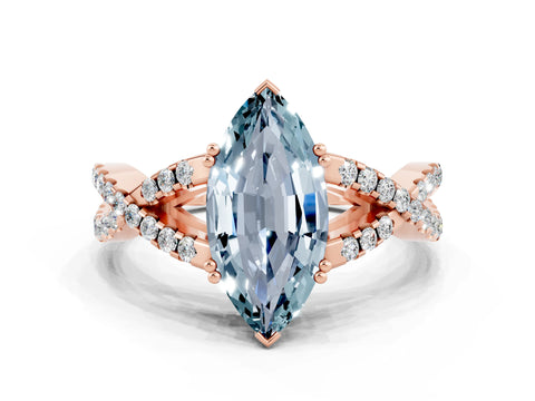 Rose gold Marquise Cut Aquamarine Solitaire Ring with Four-Prong Setting and Twisted Pavé Band