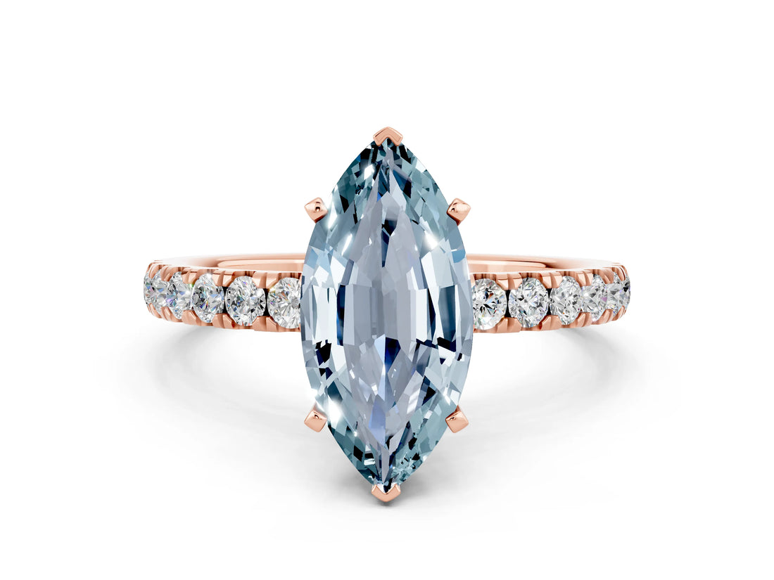 Rose gold Marquise Cut Aquamarine Solitaire Ring with Pavé Accents and Four-Prong Setting