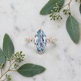 Rose gold Marquise Cut Aquamarine Solitaire Ring with Round  Pavé Band and Four-Prong Setting_45