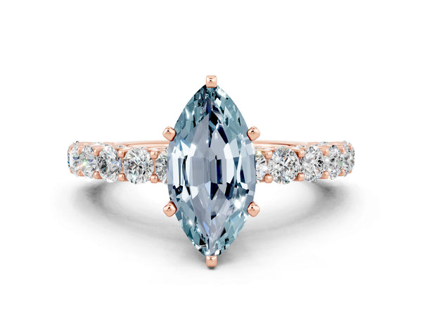Rose gold Marquise Cut Aquamarine Solitaire Ring with Shared Prong Pavé Band and Four-Prong Setting