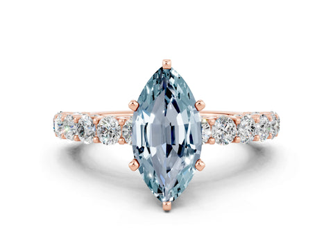 Rose gold Marquise Cut Aquamarine Solitaire Ring with Shared Prong Pavé Band and Four-Prong Setting