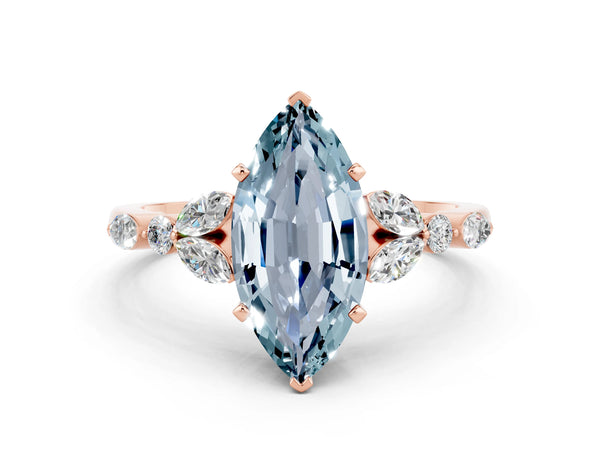 Rose gold Marquise Cut Aquamarine Solitaire Ring with Side Stones and Four-Prong Setting
