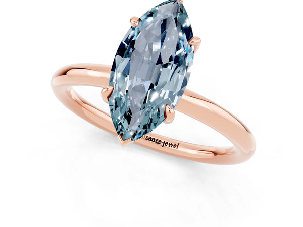 Rose gold Marquise Cut Aquamarine Solitaire Ring with Thin Band and Four-Prong Setting