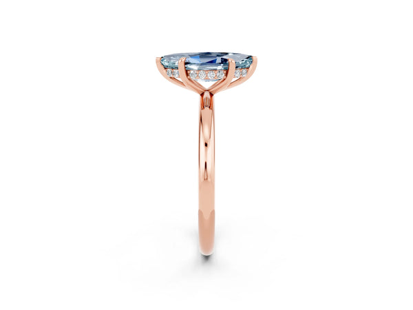 Rose gold Marquise Cut Aquamarine Solitaire Ring with Thin Band and Four-Prong Setting