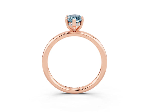 Rose gold Marquise Cut Aquamarine Solitaire Ring with Thin Band and Four-Prong Setting
