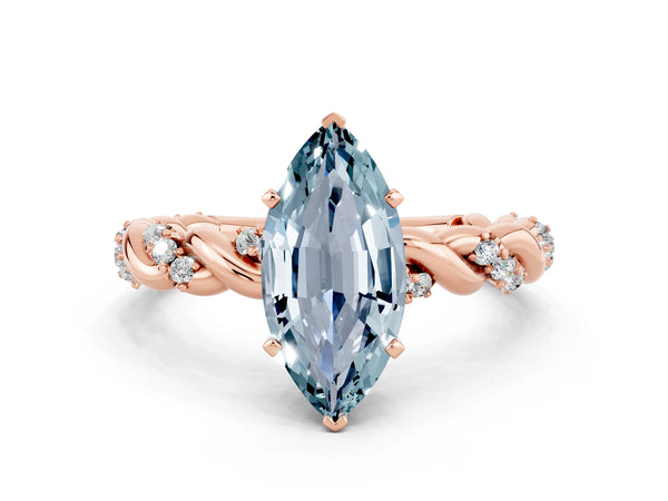 Rose gold Marquise Cut Aquamarine Solitaire Ring with Twisted Band and Pavé Accents