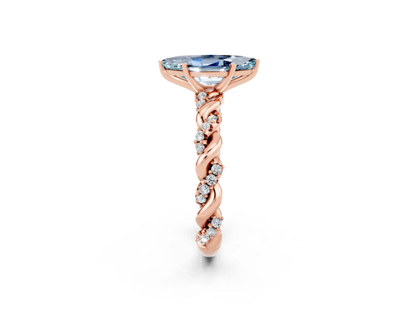 Rose gold Marquise Cut Aquamarine Solitaire Ring with Twisted Band and Pavé Accents