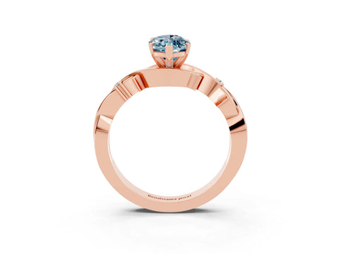 Rose gold Marquise Cut Aquamarine Solitaire Ring with Twisted Band and Prong Setting_3