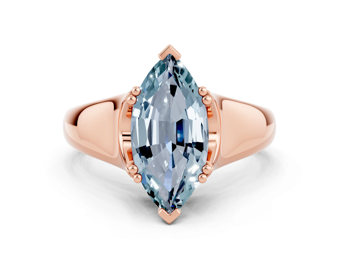 Rose gold Marquise Cut Aquamarine Solitaire Ring with Wide Band and Prong Setting