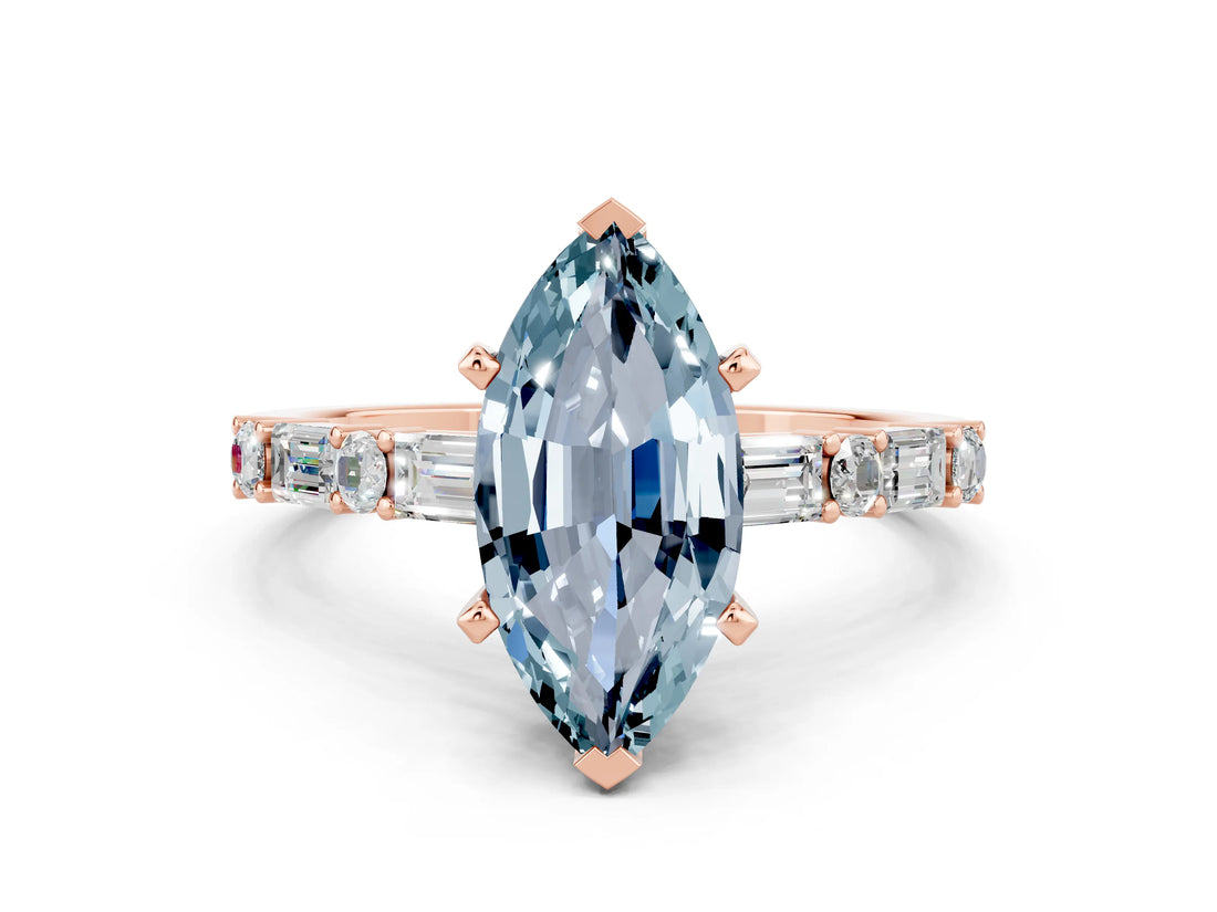 Rose gold Marquise Cut Aquamarine Solitaire with Side Baguettes and Channel Set Band