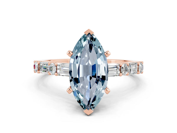 Rose gold Marquise Cut Aquamarine Solitaire with Side Baguettes and Channel Set Band
