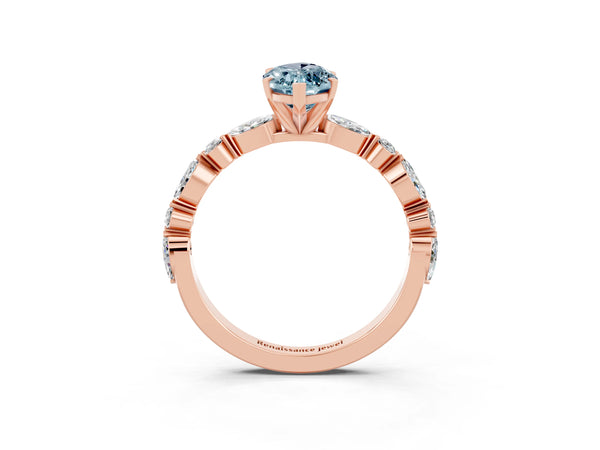 Rose gold Marquise Cut Aquamarine Ring with Marquise and Round  Side Stones and Four-Prong Setting