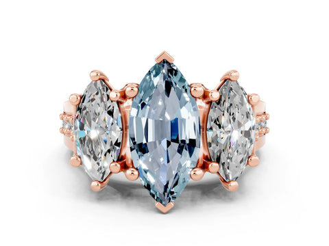 Rose gold Marquise Cut Aquamarine Three-Stone Ring with Channel Set Band and Four-Prong Setting