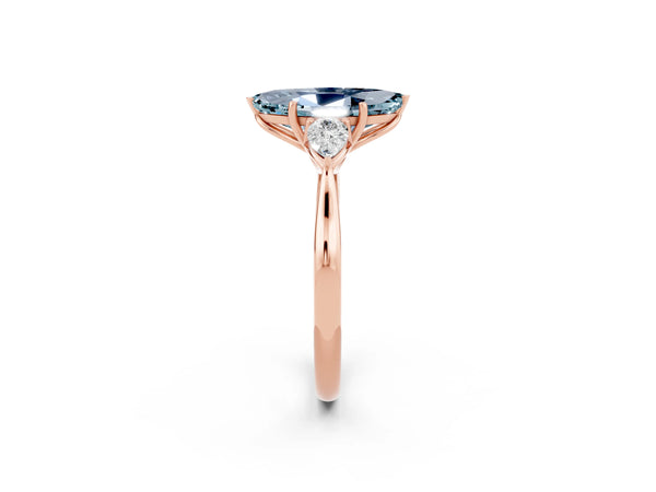 Rose gold Marquise Cut Aquamarine Three-Stone Ring with Pear  Side Stones and Prong Setting