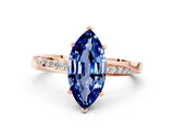 Rose gold Marquise Cut Blue Sapphire Engagement Ring with Side Stone Accents and Four-Prong Setting_60