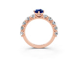 Rose gold Marquise Cut Blue Sapphire Prong Setting with Side Stones on a Pave Band_3