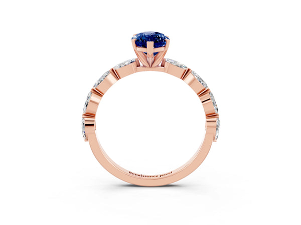 Rose gold Marquise Cut Blue Sapphire Ring with Marquise Side Stones and Prong Setting