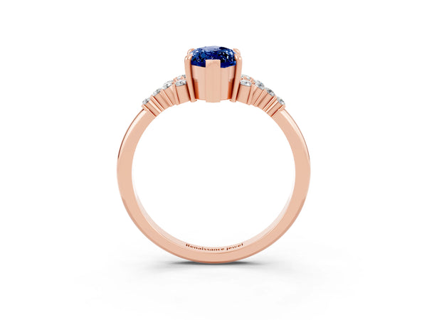 Rose gold Marquise Cut Blue Sapphire Ring with Side Stones and Four-Prong Setting