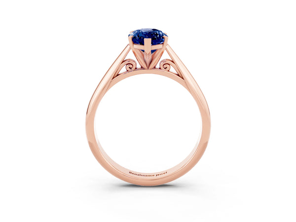Rose gold Marquise Cut Blue Sapphire Solitaire Engagement Ring with Cathedral Setting and Four-Prong Mount