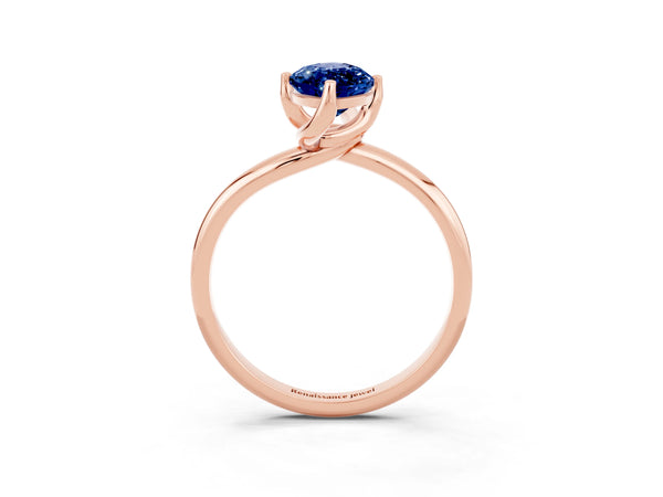 Rose gold Marquise Cut Blue Sapphire Solitaire Engagement Ring with Four-Prong Setting and Classic Band