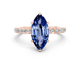 Rose gold Marquise Cut Blue Sapphire Solitaire Engagement Ring with Pavé Band and Four-Prong Setting