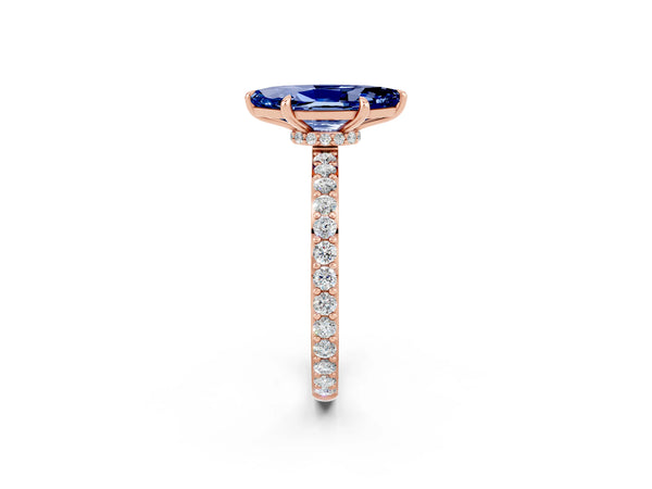 Rose gold Marquise Cut Blue Sapphire Solitaire Engagement Ring with Pavé Band and Four-Prong Setting