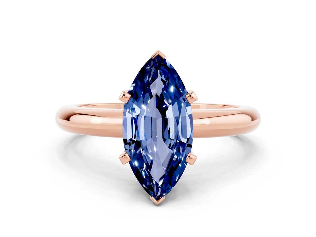 Rose gold Marquise Cut Blue Sapphire Solitaire Engagement Ring with Round Band and Four-Prong Setting