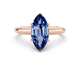 Rose gold Marquise Cut Blue Sapphire Solitaire Engagement Ring with Round Band and Four-Prong Setting