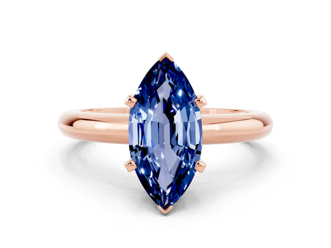 Rose gold Marquise Cut Blue Sapphire Solitaire Engagement Ring with Round Band and Four-Prong Setting