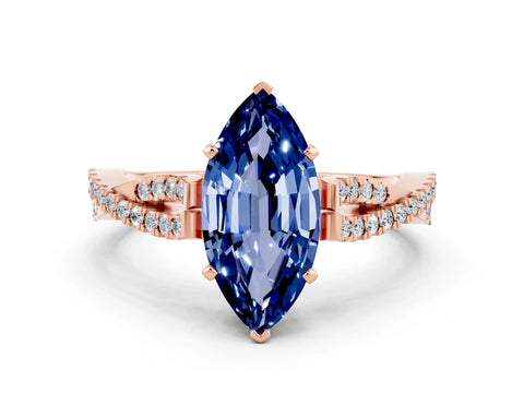 Rose gold Marquise Cut Blue Sapphire Solitaire Engagement Ring with Twisted Pavé Band and Four-Prong Setting