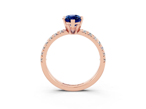 Rose gold Marquise Cut Blue Sapphire Solitaire Pavé Engagement Ring with Round Band and Prong Setting